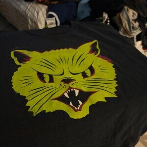 black tshirt green fanged cat szM